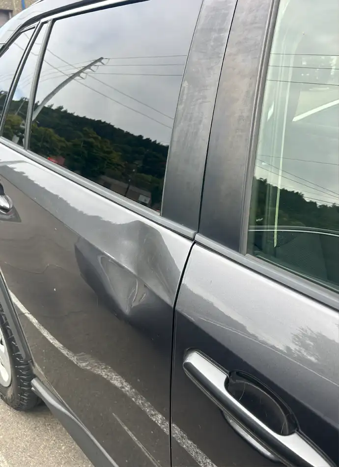 Before paintless door ding removal