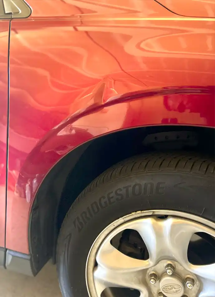 Pdr on a car wing before