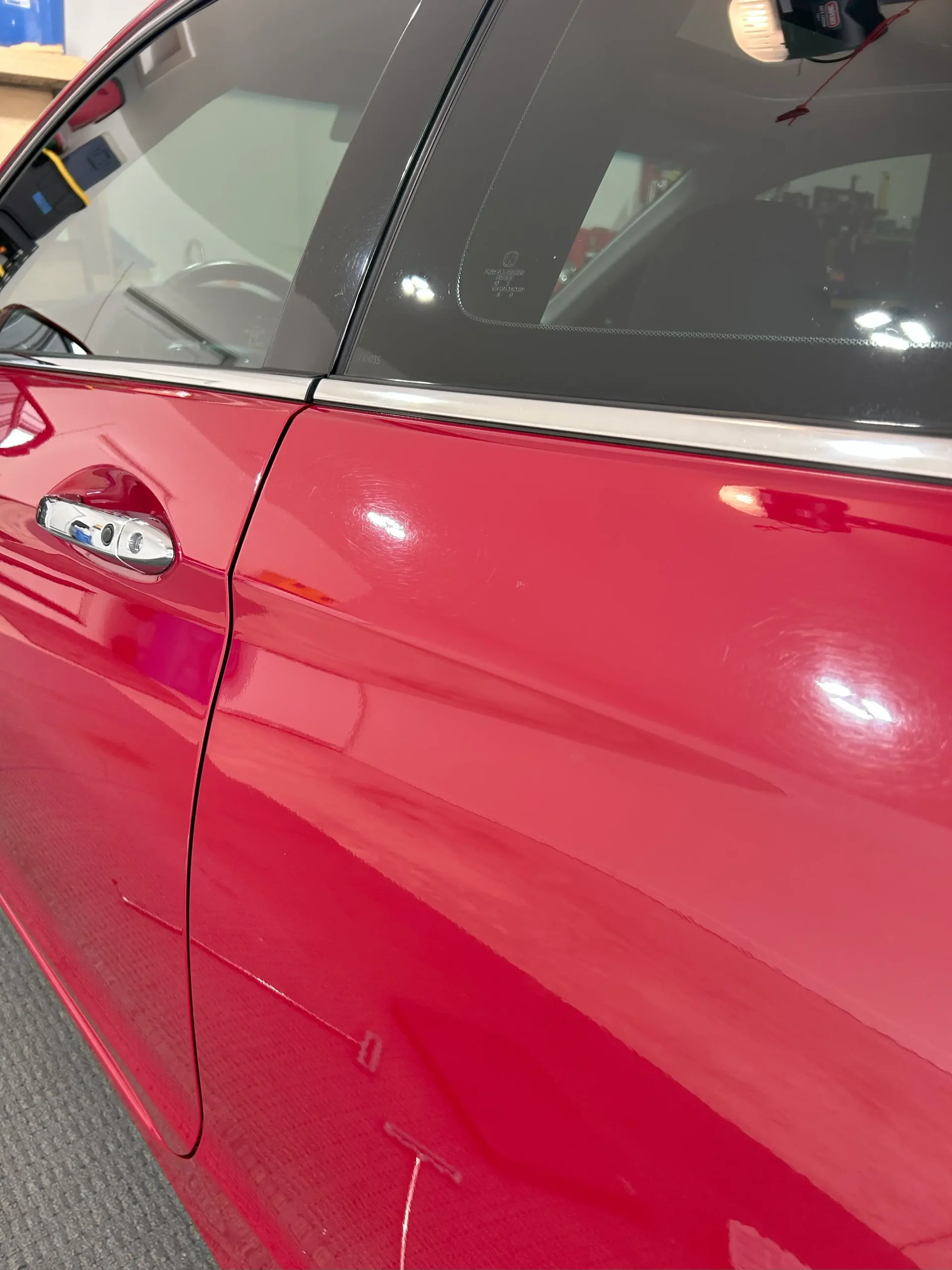 Paintless door dent repair after