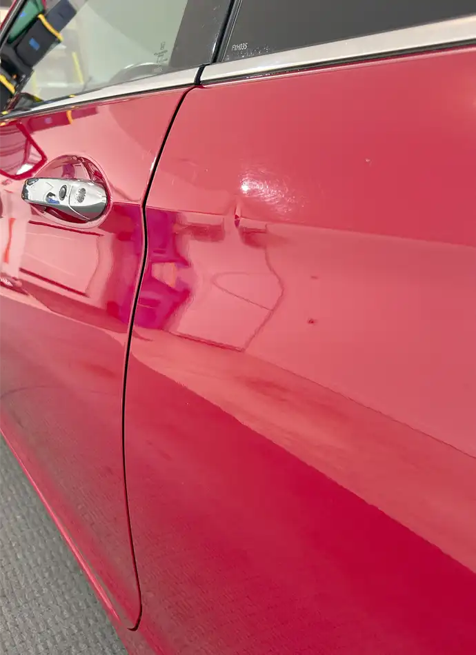 Paintless door dent repair